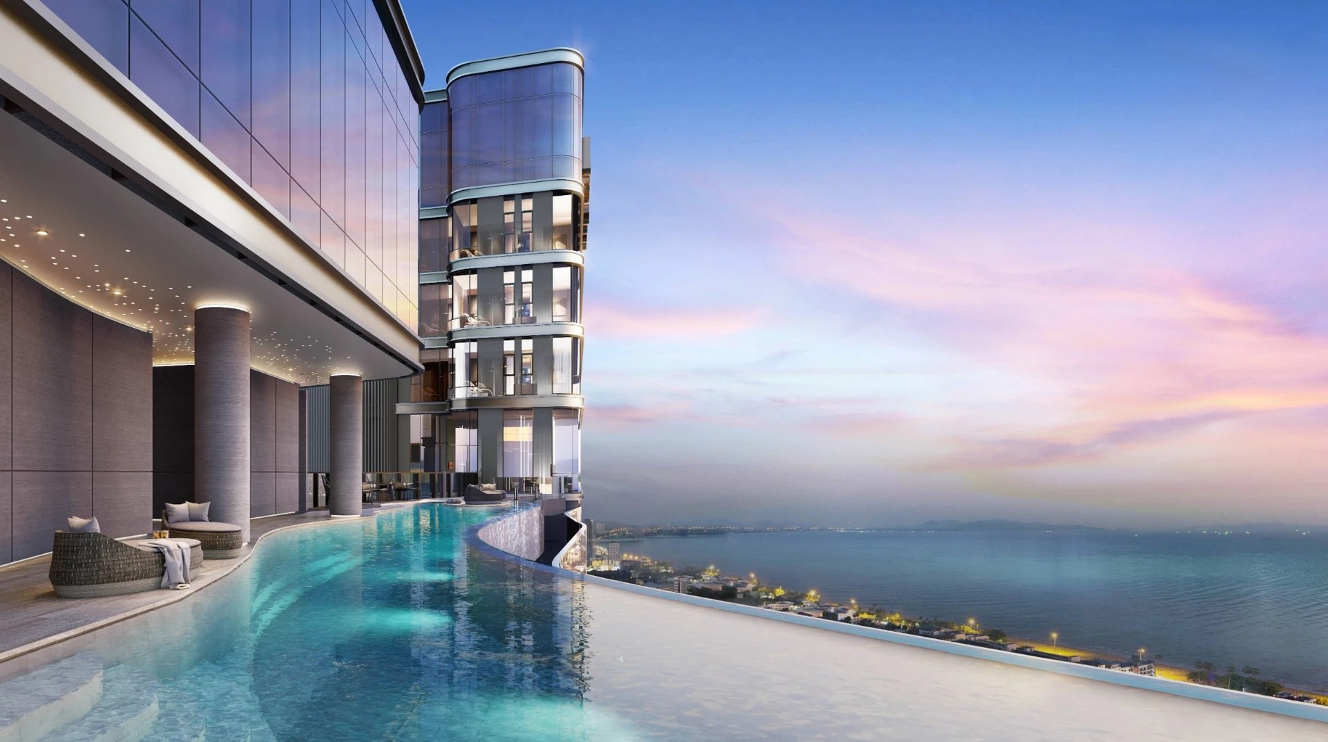 Aquarous Jomtien Pattaya — rooftop pool close-up at dusk