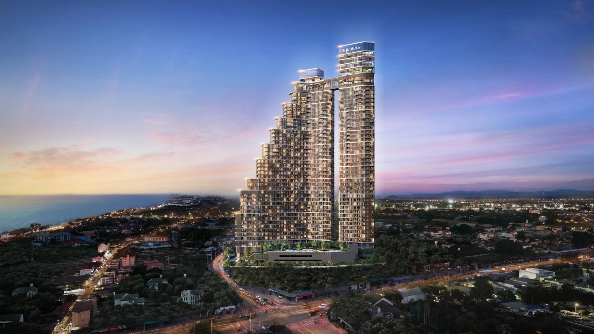 Aquarous Jomtien Pattaya — full twin-tower view at dusk